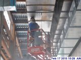 Welding black iron duct work at the 4th floor Facing South.jpg